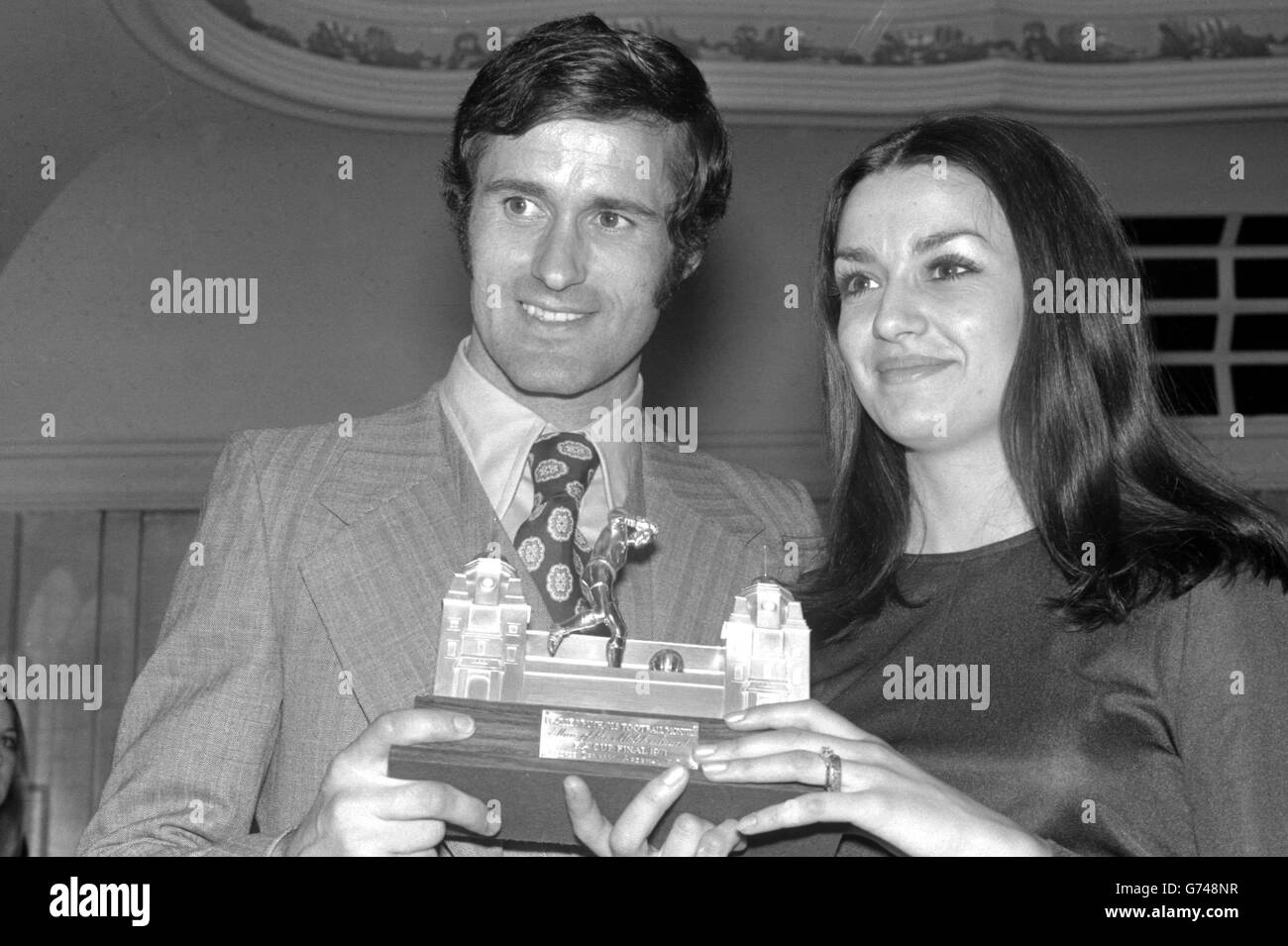 Arsenal's George Graham with his wife Marie, holding the Football Man of the Match trophy presented to him at the banquet after Arsenal's victory over Liverpool in the FA Cup Final. Stock Photo