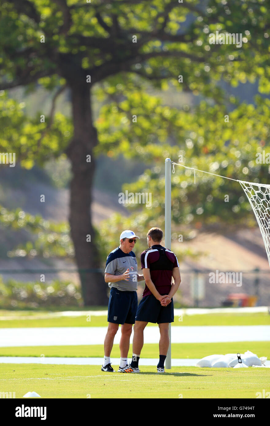 Soccer - FIFA World Cup 2014 - Group D - Uruguay v England - England Training and Press Conference - Urca Military Training G.... England manager Roy Hodgson with Steven Gerrard during a training session at the Urca Military Training Ground, Rio de Janeiro, Brazil. Stock Photo