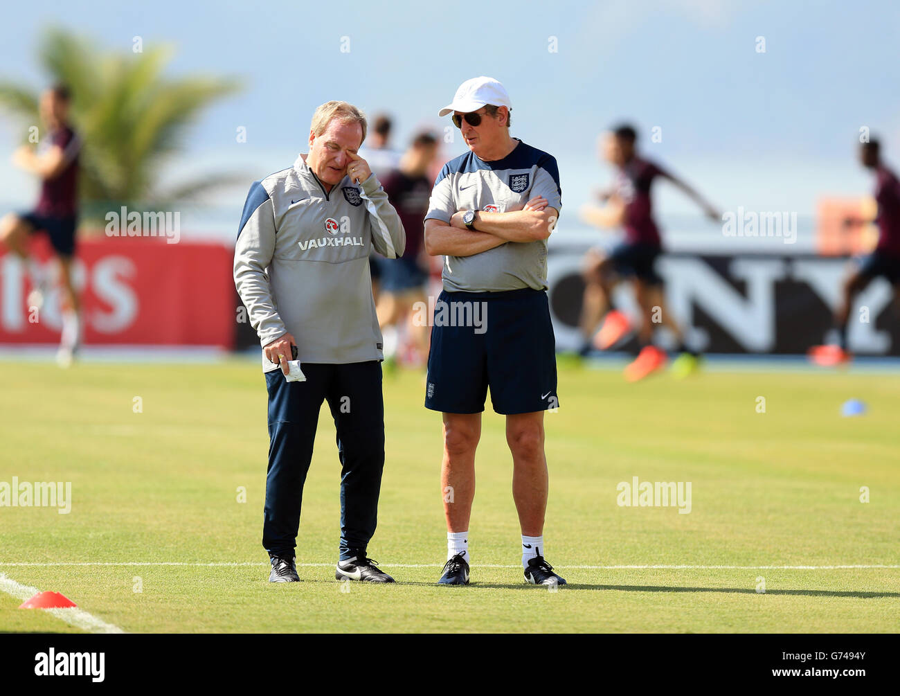 Soccer - FIFA World Cup 2014 - Group D - Uruguay v England - England Training and Press Conference - Urca Military Training G.... England manager Roy Hodgson with Ray Lewington during a training session at the Urca Military Training Ground, Rio de Janeiro, Brazil. Stock Photo