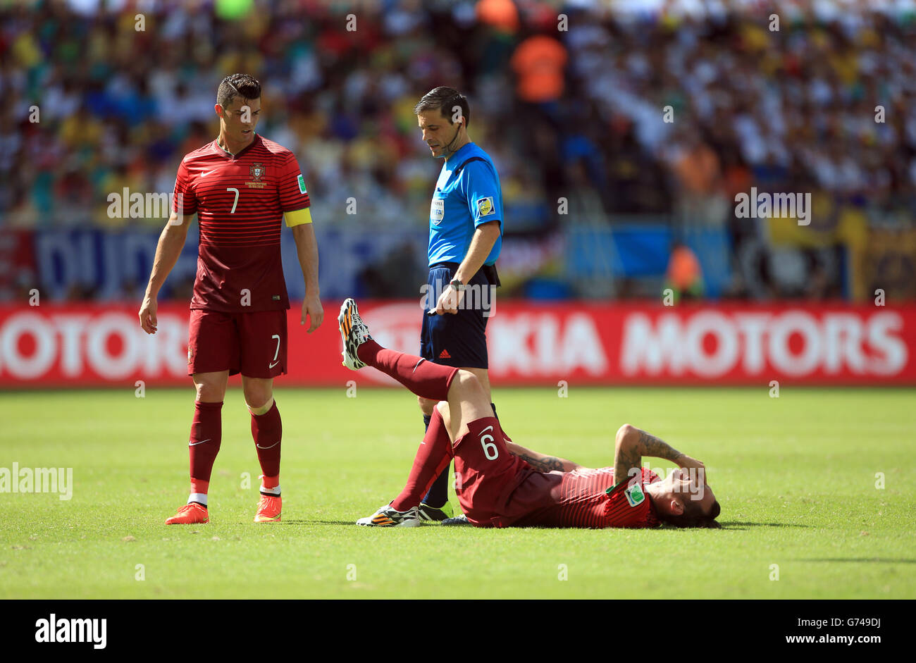 Soccer - FIFA World Cup 2014 - Group G - Germany v Portugal - Arena Fonte Nova. Portugal's Hugo Almeida lies on the floor injured Stock Photo