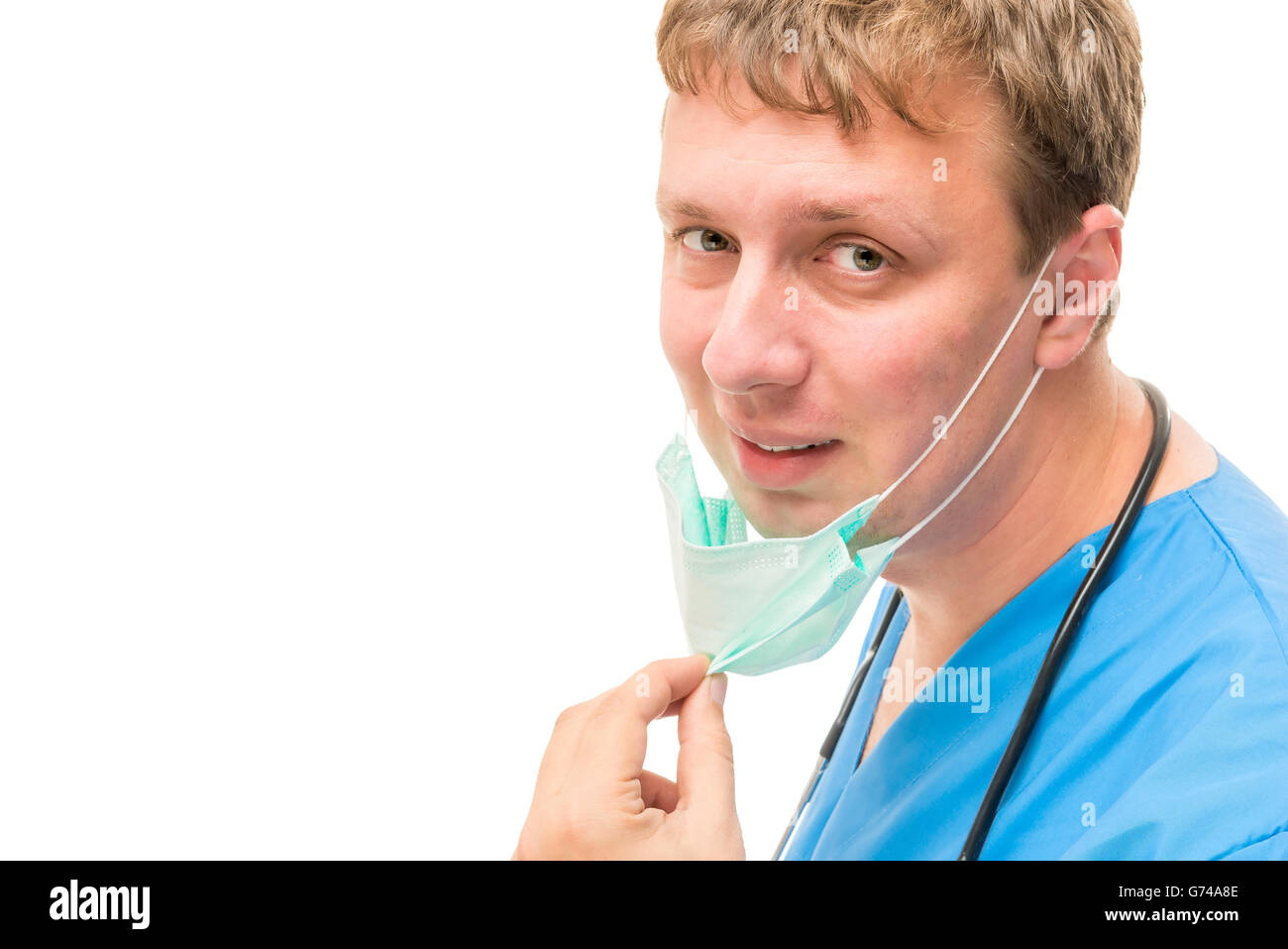 young professional surgeon pulled the mask from the face Stock Photo