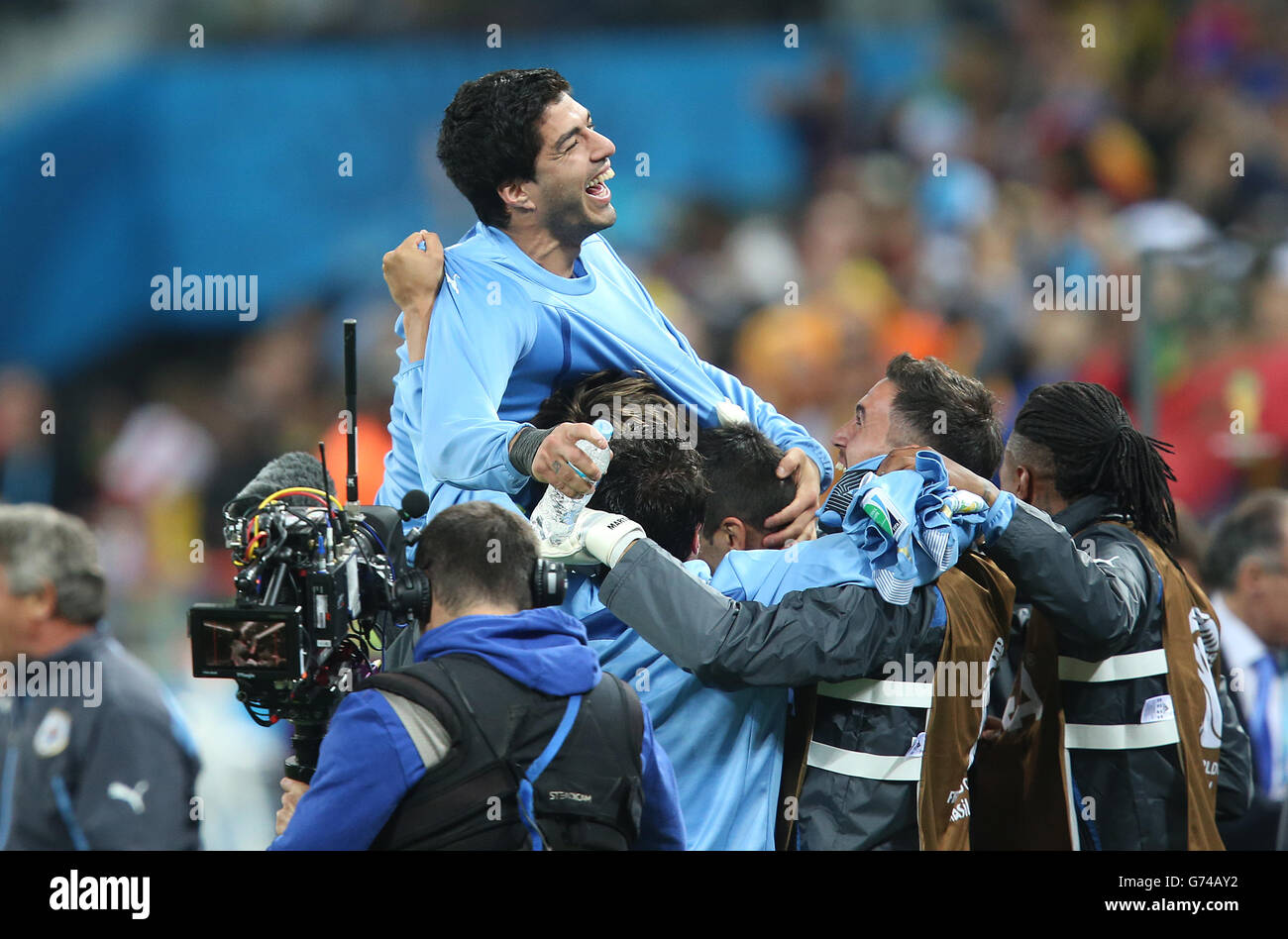 Uruguay's Luis Suarez celebrates scoring his side's second goal during the Group D match the Estadio do Sao Paulo, Sao Paulo, Brazil. Stock Photo