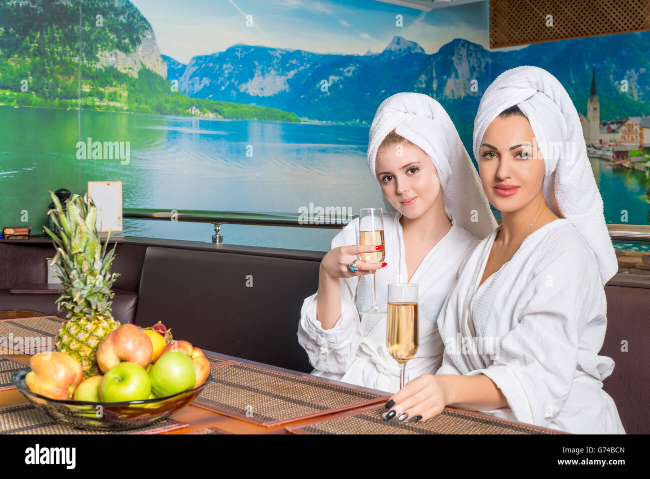 two friends at the table restore power after spa Stock Photo