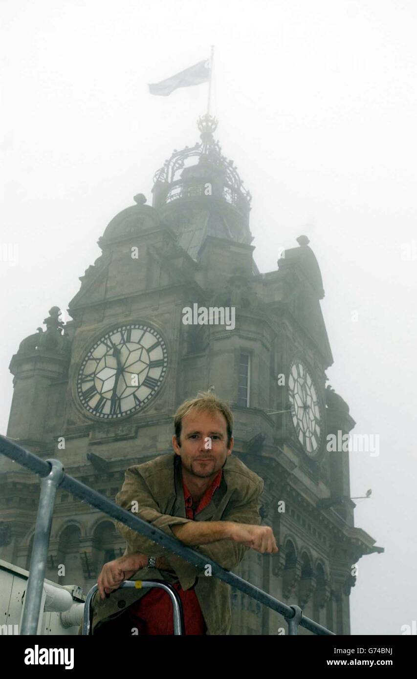 Jason Connery, son of James Bond actor Sean Connery, in front of the clocktower at the Balmoral Hotel in Edinburgh, to launch the BBC's ambitious new drama series, Shoebox Zoo which will be shown this autumn. The clocktower features in the drama that follows the adventures of 11-year-old American Marnie McBride as she gets to grip with her new life in Scotland and struggles to cope with the death of her mother. Stock Photo