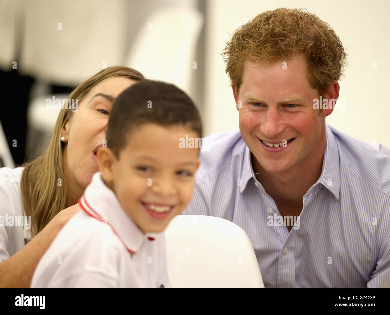 Prince Harry chats to patients in the Rede Sarah Hospital for