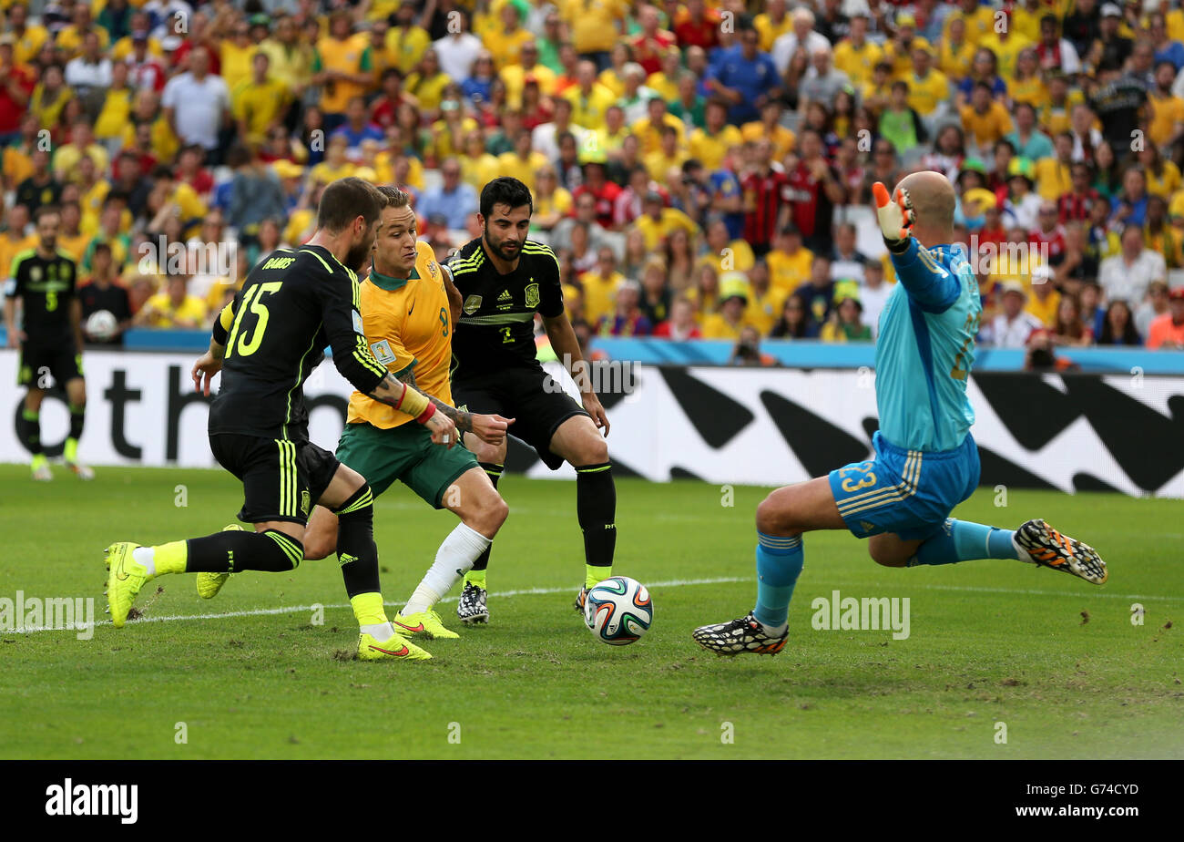 Spain's Sergio Ramos (left), Raul Albiol and Pepe Reina (right) battle for the ball with Australia's Adam Taggart Stock Photo