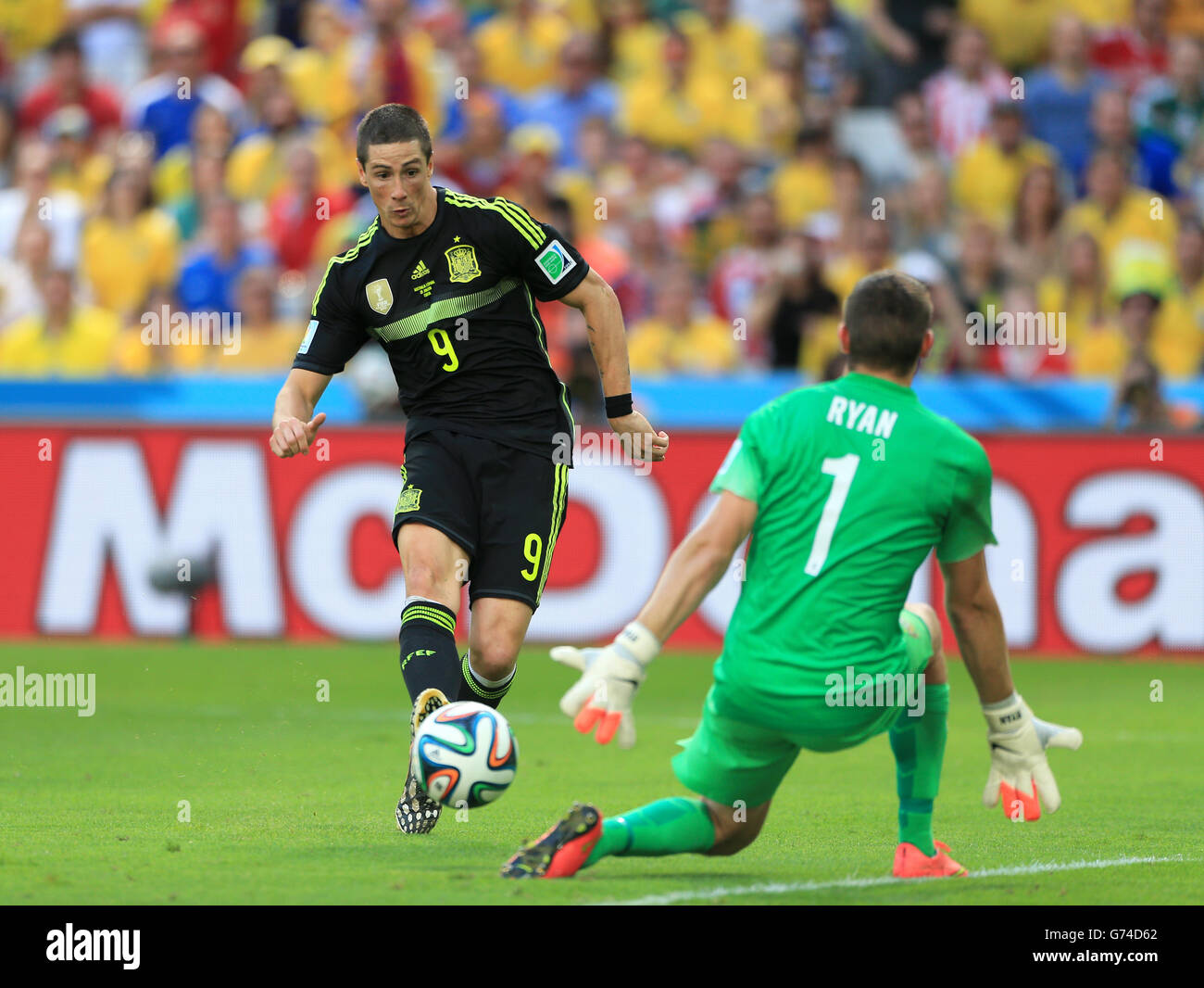 Spain's Fernando Torres scores his team's second goal past Australia's Mathew Ryan Stock Photo