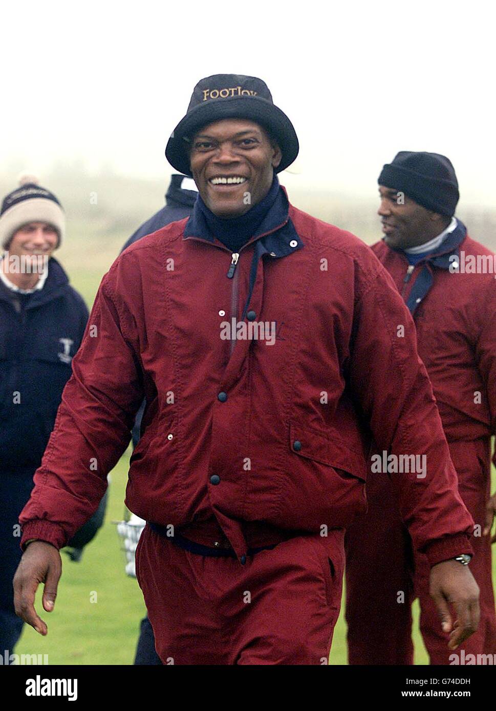 American movie actor Samuel L Jackson braves the weather on the driving range at the start of the Dunhill Links Championships at Carnoustie, Scotland. lwpp Stock Photo