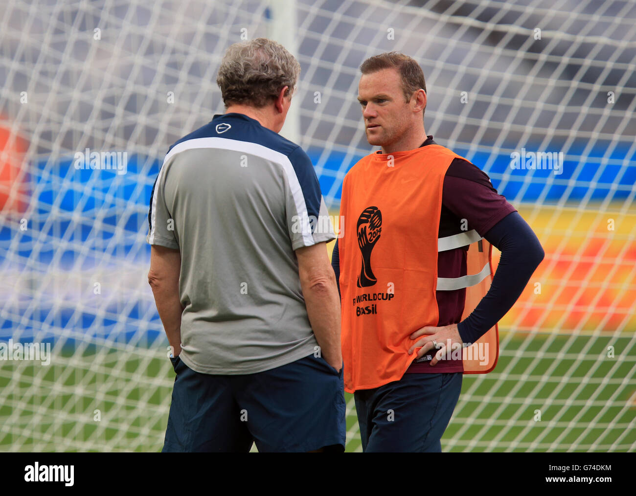 Soccer - FIFA World Cup 2014 - Group D - Costa Rica v England - Day Three - England Training and Press Conference - Estadio M.... England manager Roy Hodgoson chats with Wayne Rooney during a training session at the Estadio Mineirao, Belo Horizonte, Brazil. Stock Photo