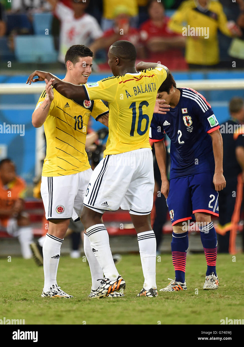 Colombia's James Rodriguez scores his side's fourth goal of the game with Colombia's Eder Balanta Stock Photo