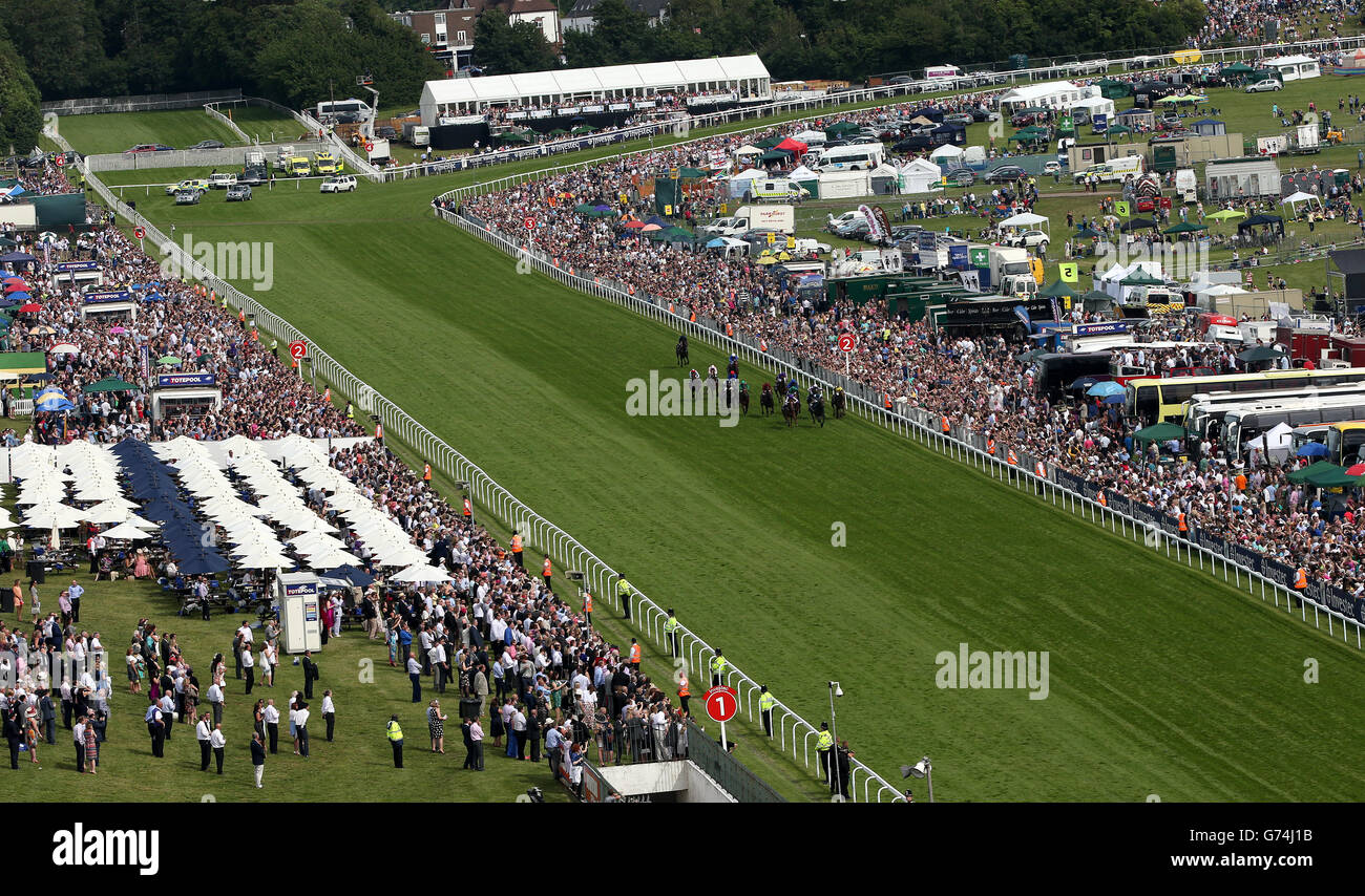 Horse Racing - Investec Derby Day 2014 - Epsom Downs Racecourse. Aerial view of Investec Derby Day 2014 held at Epsom Downs Racecourse Stock Photo