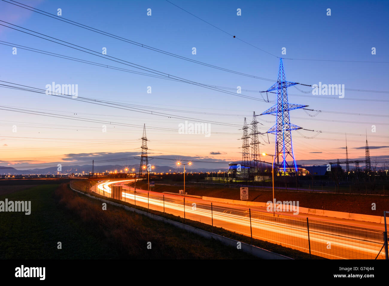 S1 highway and Substation Vienna Southeast Austrian Power Grid , spotlighted Pylon, Wien, Vienna, Austria, Wien, 10. Stock Photo