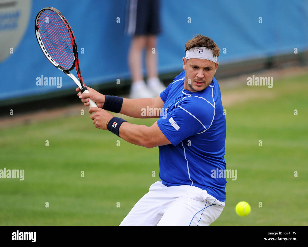 Great Britain's Marcus Willis in action against Romania's Marius Copil during the AEGON Nottingham Challenge at The Nottingham Tennis Centre, Nottingham. Stock Photo