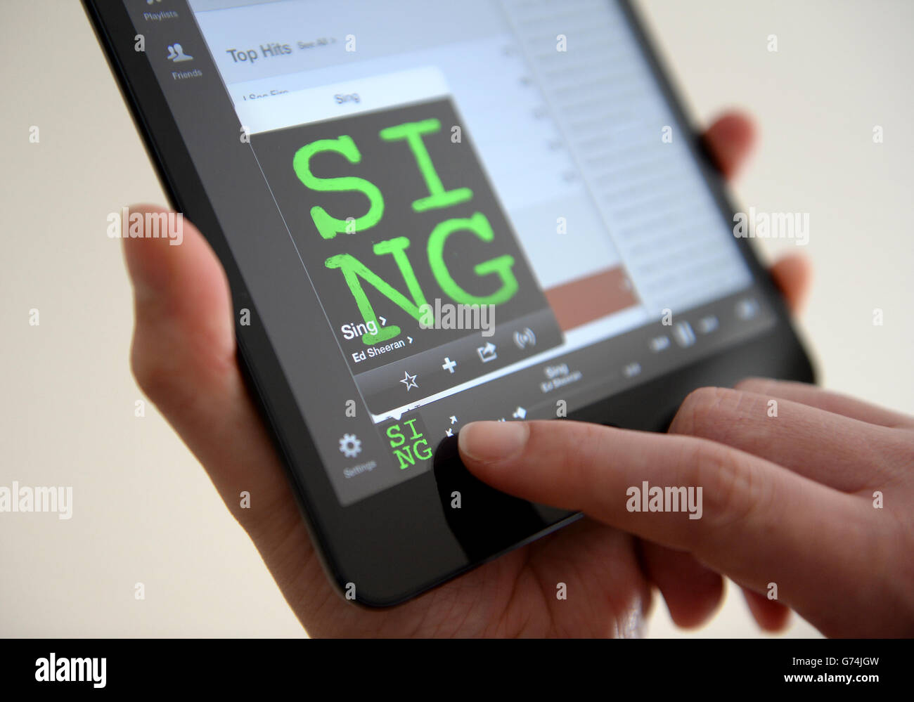 The Spotify is used on an Apple iPad mini Stock Photo - Alamy