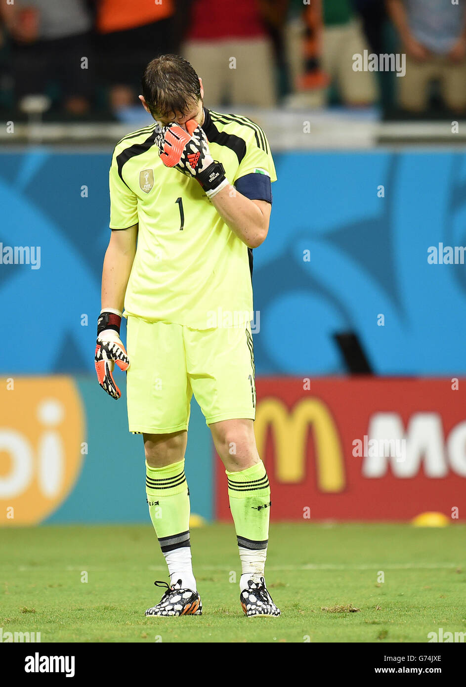 Spain goalkeeper Iker Casillas looks dejected after Netherlands' Robin
