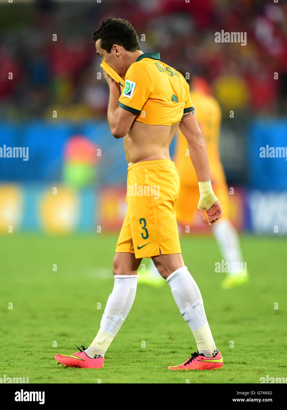 Soccer - FIFA World Cup 2014 - Group B - Chile v Australia - Arena Pantanal. Australia's Jason Davidson stands dejected Stock Photo