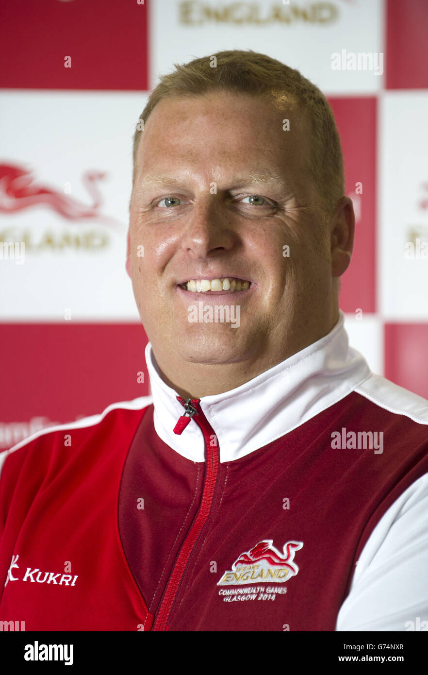 Team England swimming coach Jon Rudd during a kitting out session at St George's Park, Burton ahead of the 2014 Commonwealth Games Stock Photo