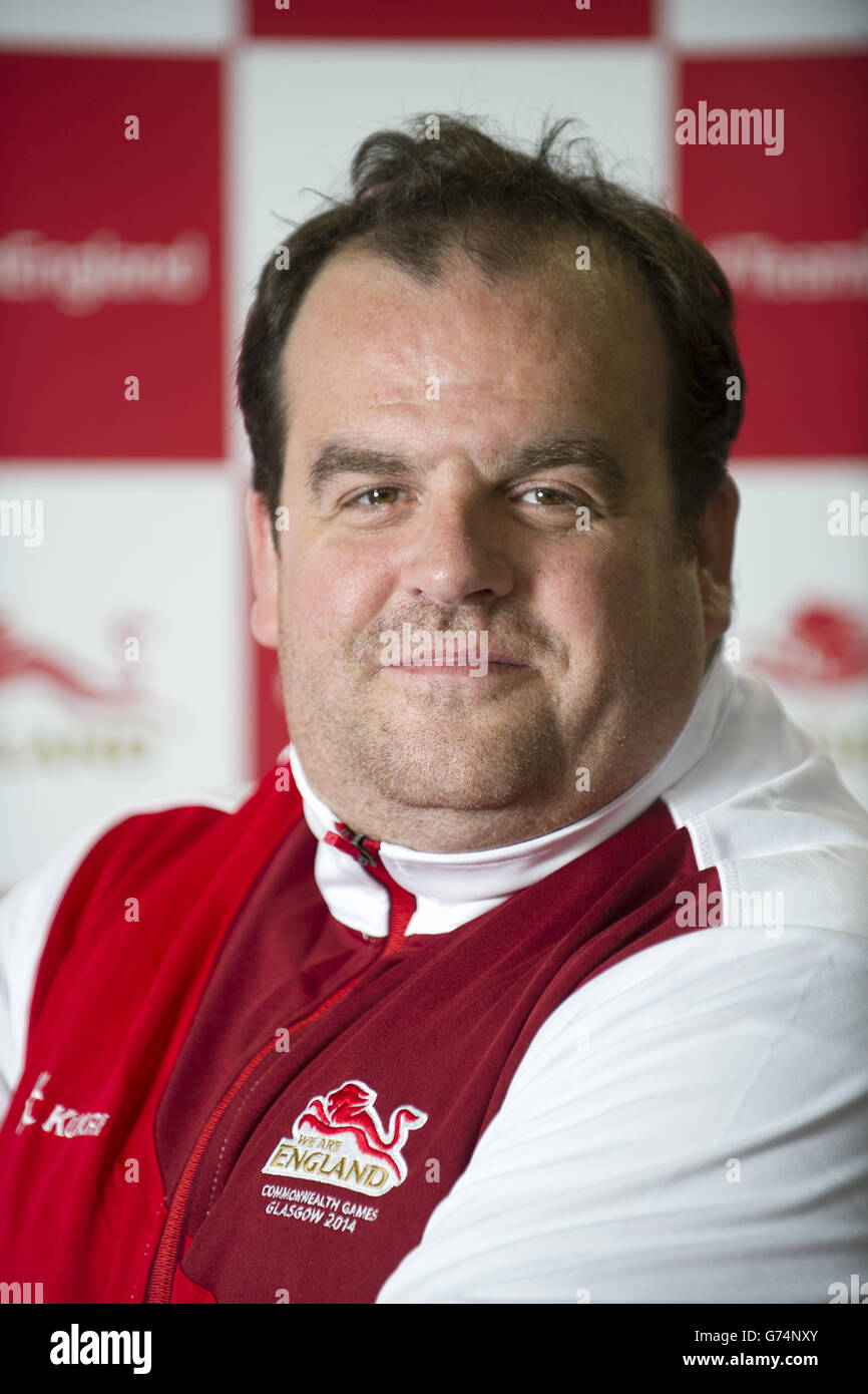 Team England swimming coach Russ Barber during a kitting out session at St George's Park, Burton ahead of the 2014 Commonwealth Games Stock Photo