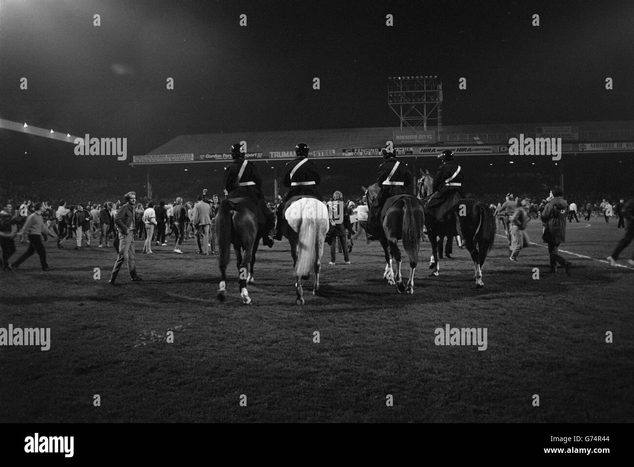 Mounted police try to keep jubilent fans under control after the FA Cup semi final replay at Maine Road, Manchester, where Manchester United beat Liverpool 2-1. Stock Photo