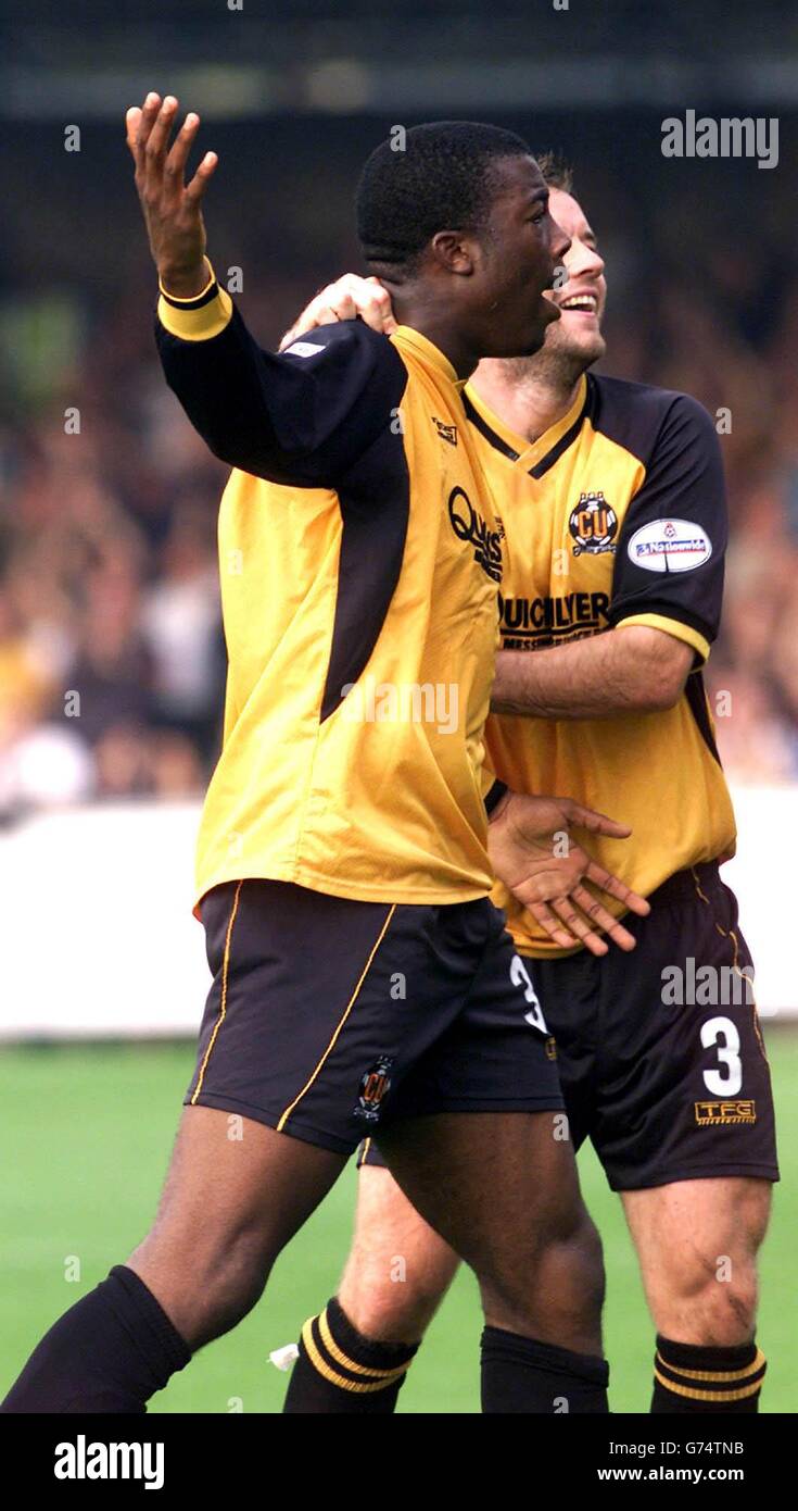 Cambridge United's Armand One celebrates scoring against Bury with Ian Ashbee during the Nationwide Division Two match at Abbey Stadium, Cambridge. NO UNOFFICIAL CLUB WEBSITE USE. Stock Photo