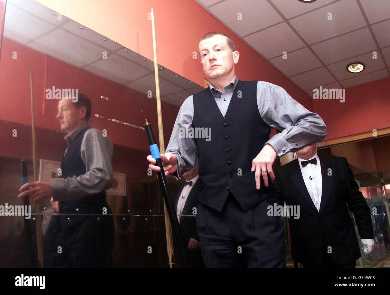 Steve Davis leaves his dresing room to begin his match with Patrick Wallace, at the LG Cup at the Guildhall, Preston. Stock Photo