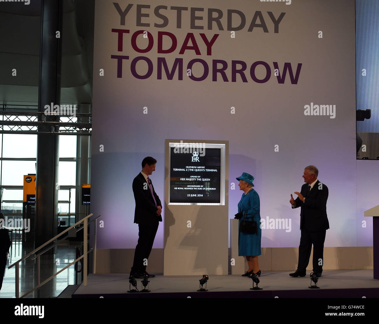 Queen Elizabeth II officially opens the new Terminal 2 The Queen's Terminal at Heathrow Airport. Stock Photo