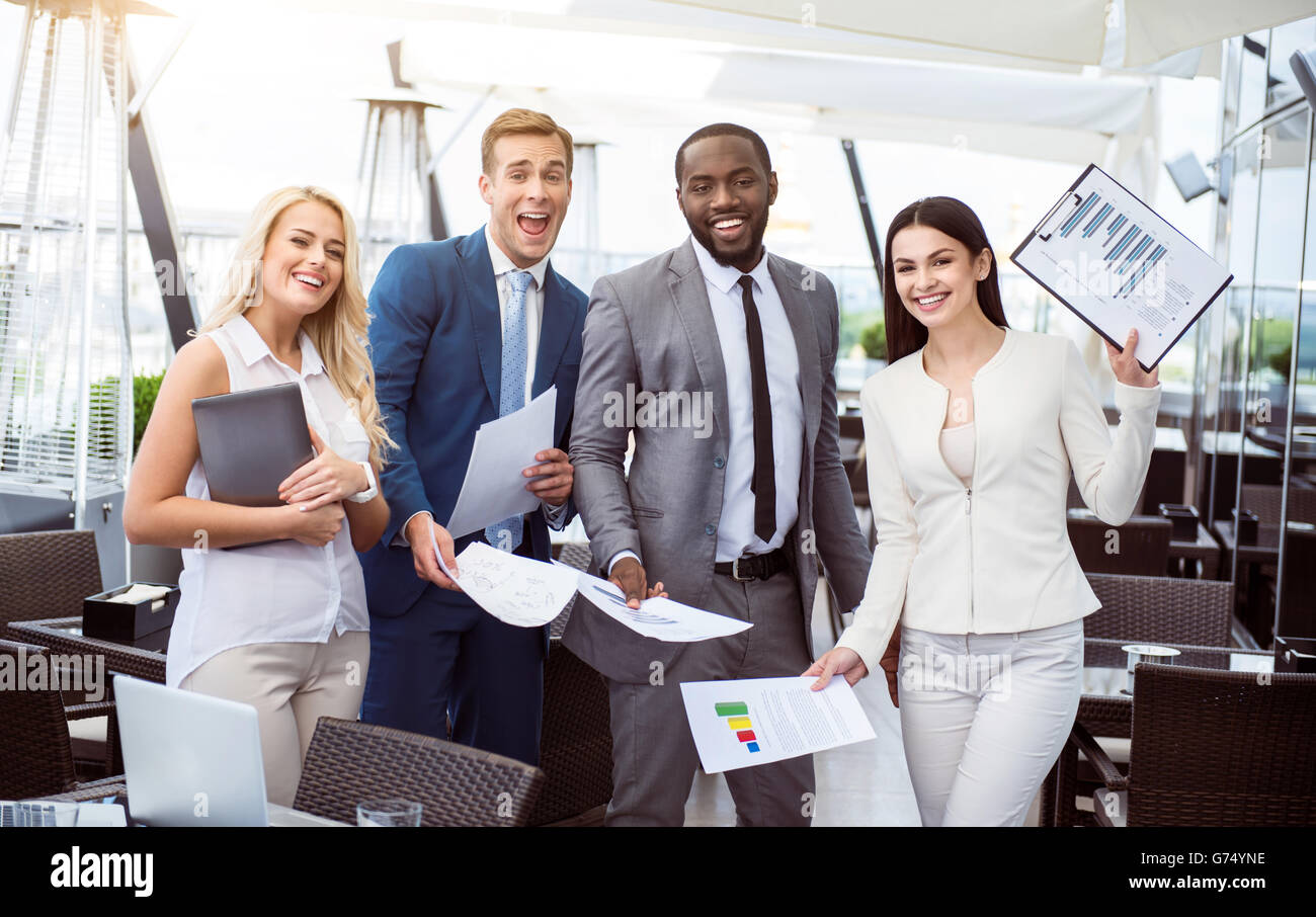 Overjoyed business colleagues in office hi-res stock photography and ...