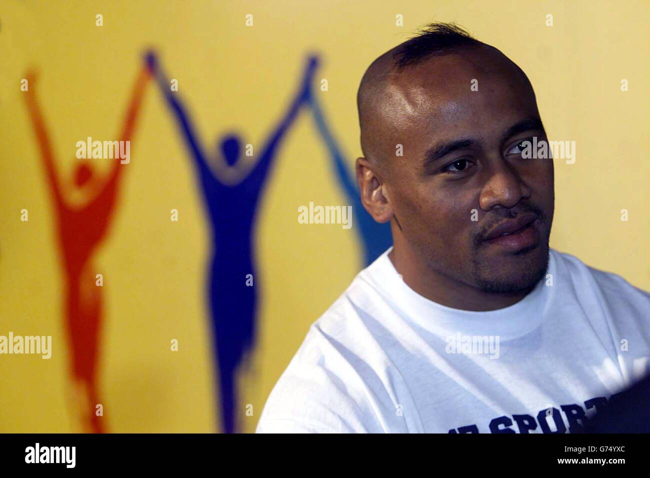 Jonah Lomu looks on whilst promoting the Commonwealth Game at The Printworks, Manchester. New Zealand All Blacks' Jonah Lomu took on former Olympic gold medalist Linford Christie in a head-to-head 50 metre sprint. * as part of the countdown towards the 2002 Commonwealth Games. Linford won the race against Jonah. Stock Photo