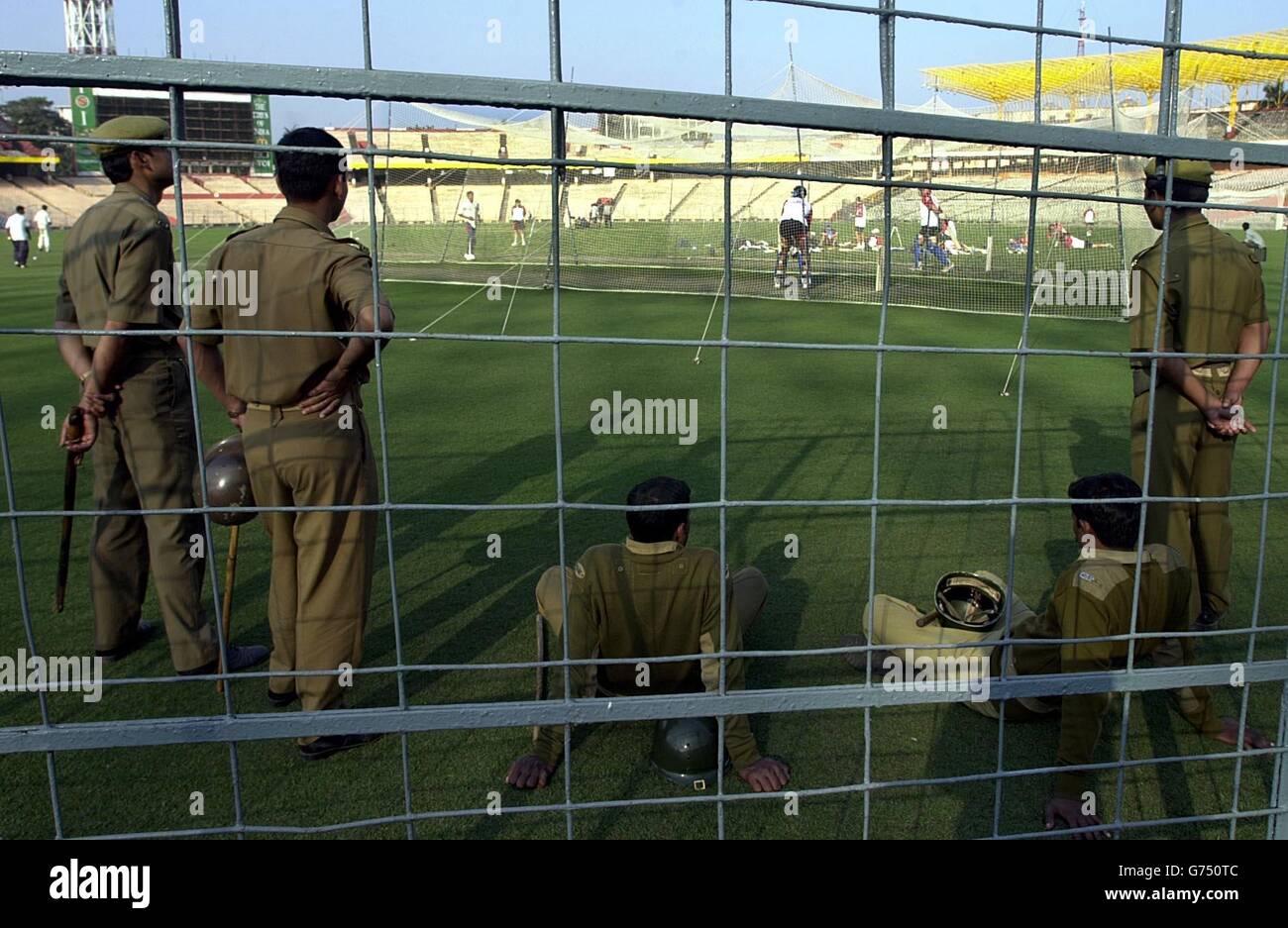 England Cricket practice. Security police officers watch England