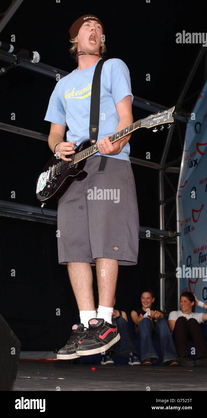 James Bourne from pop group Busted performing on stage at the Fox FM Party in the Park, held at South Park in Oxford. Stock Photo