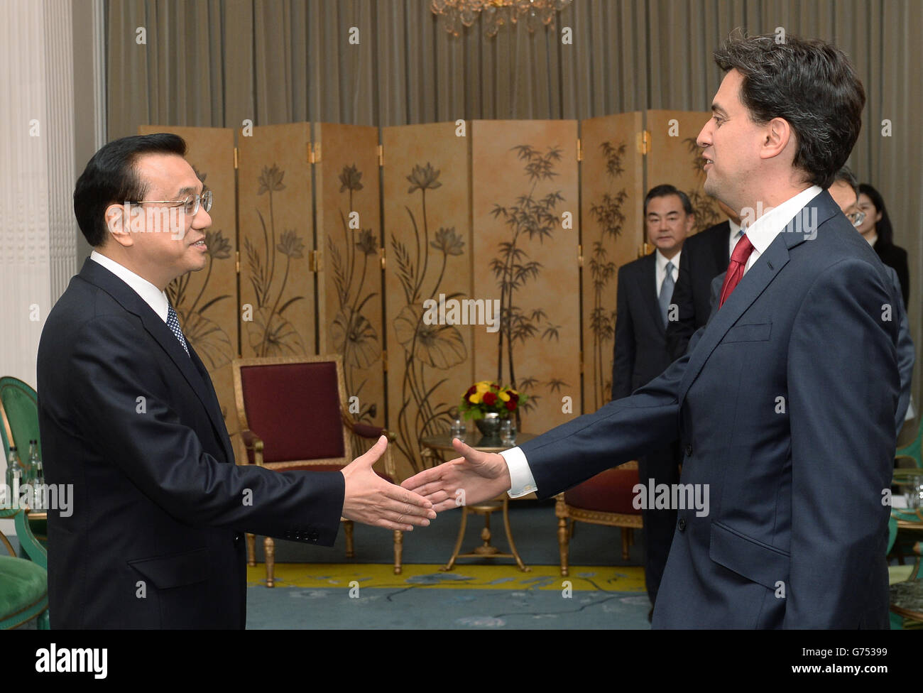 Labour leader Ed Miliband meets Chinese Prime Minister, Li Keqiang (left) at his hotel in central London today during the Chinese Premier's three day visit to the UK. Stock Photo