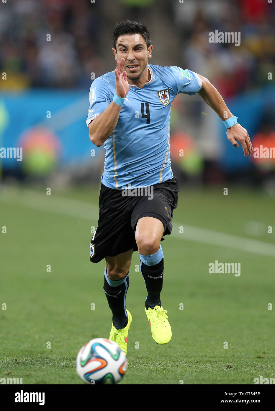 Soccer - FIFA World Cup 2014 - Group D - Uruguay v England - Estadio Do Sao Paulo. Jorge Fucile, Uruguay Stock Photo