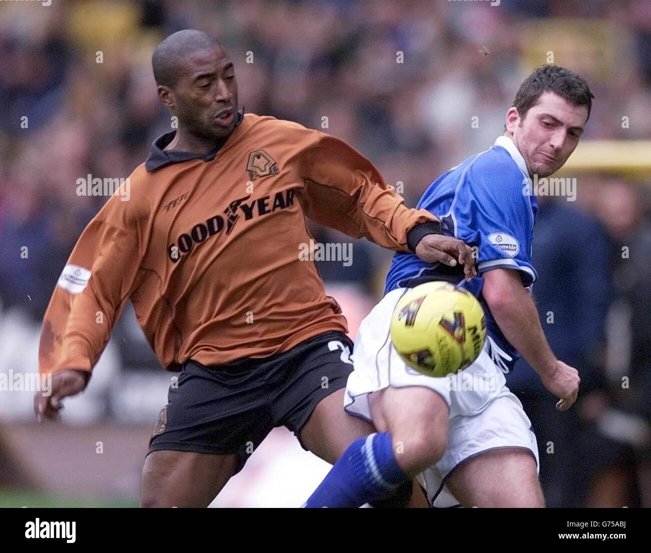 Wolves's Dean Sturridge tussles with Birmingham City defender Nicky