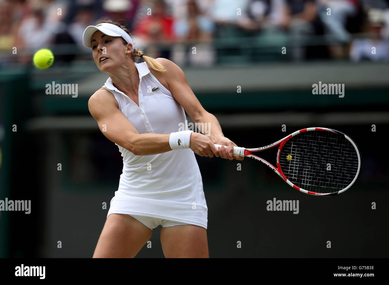 France's Alize in action against USA's Serena Williams during