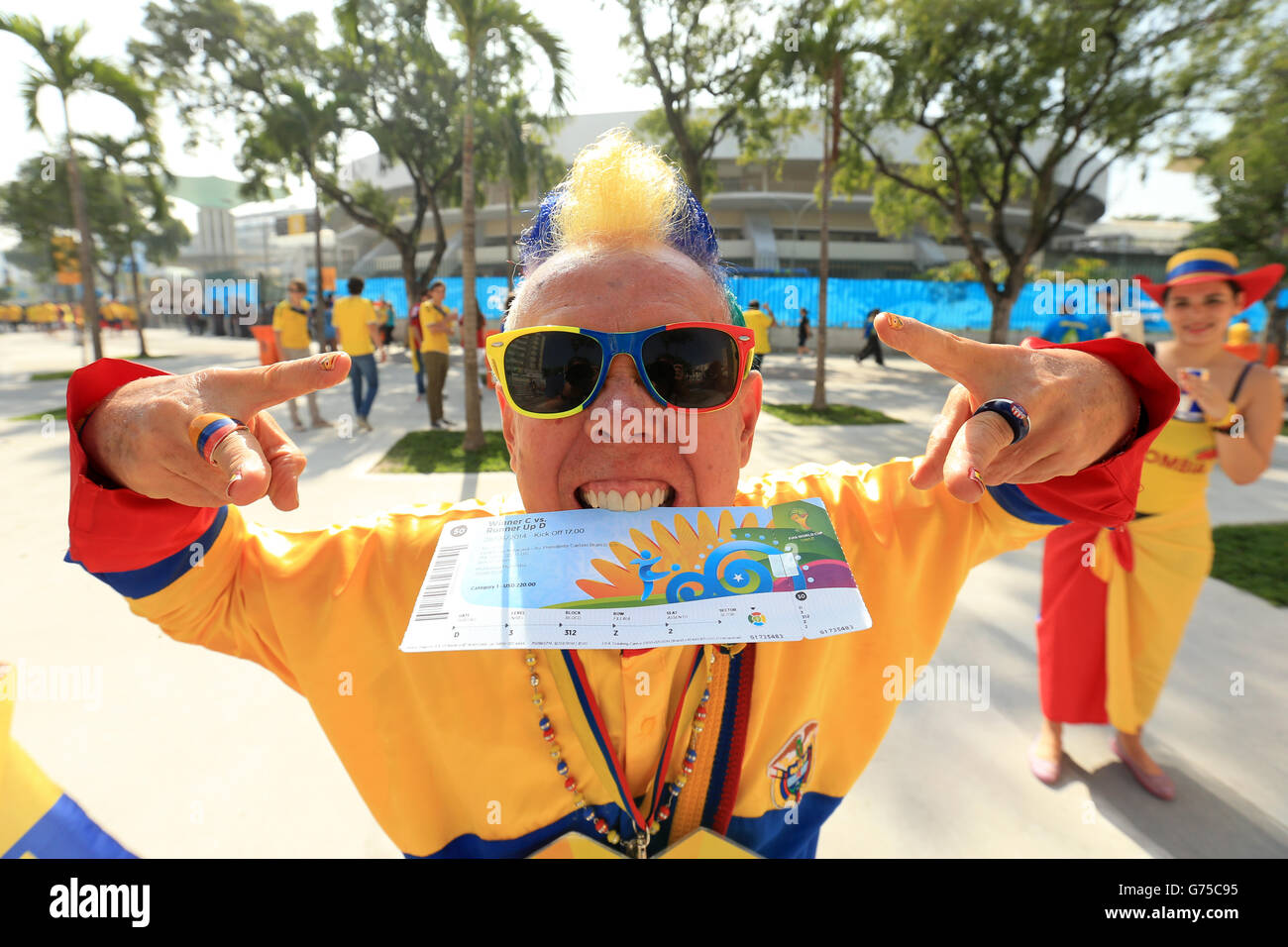 A Colombia fan shows his support outside the ground before the FIFA World Cup, Round of 16 match at the Estadio do Maracana, Rio de Janeiro, Brazil. PRESS ASSOCIATION Photo. Picture date: Saturday June 28, 2014. Photo credit should read: Mike Egerton/PA Wire. RESTRICTIONS: No commercial use. No use with any unofficial 3rd party logos. No manipulation of images. No video emulation Stock Photo