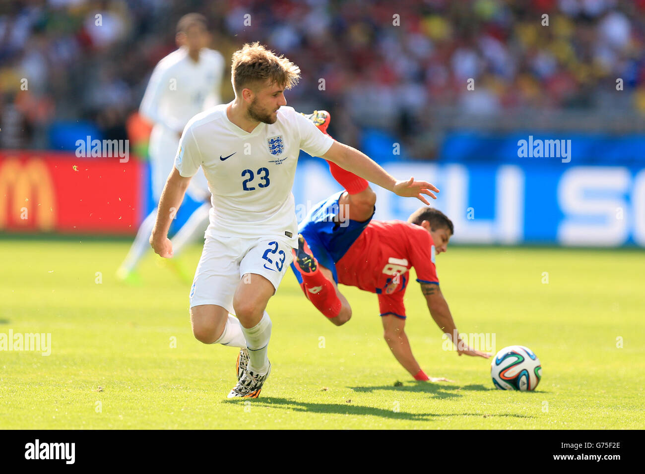 England's Luke Shaw and Costa Rica's Cristian Gamboa (right) battle for the ball during the FIFA World Cup, Group D match at the Estadio Mineirao, Belo Horizonte, Brazil. Stock Photo