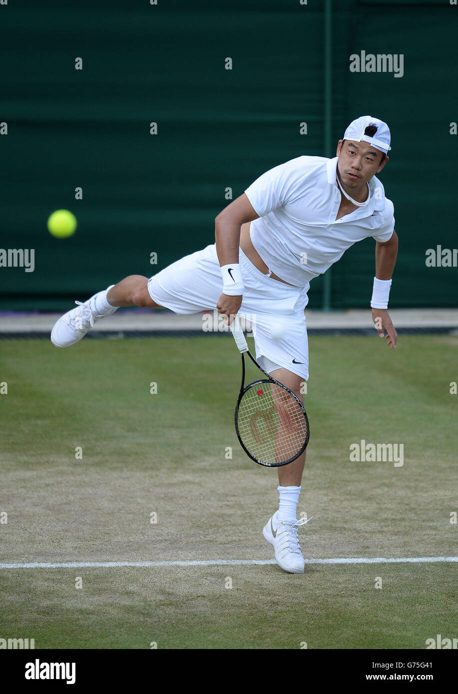 Chinese Taipei's Jimmy Wang in action against France's Jo-Wilfried Tsonga  during day five of the Wimbledon Championships at the All England Lawn  Tennis and Croquet Club, Wimbledon Stock Photo - Alamy
