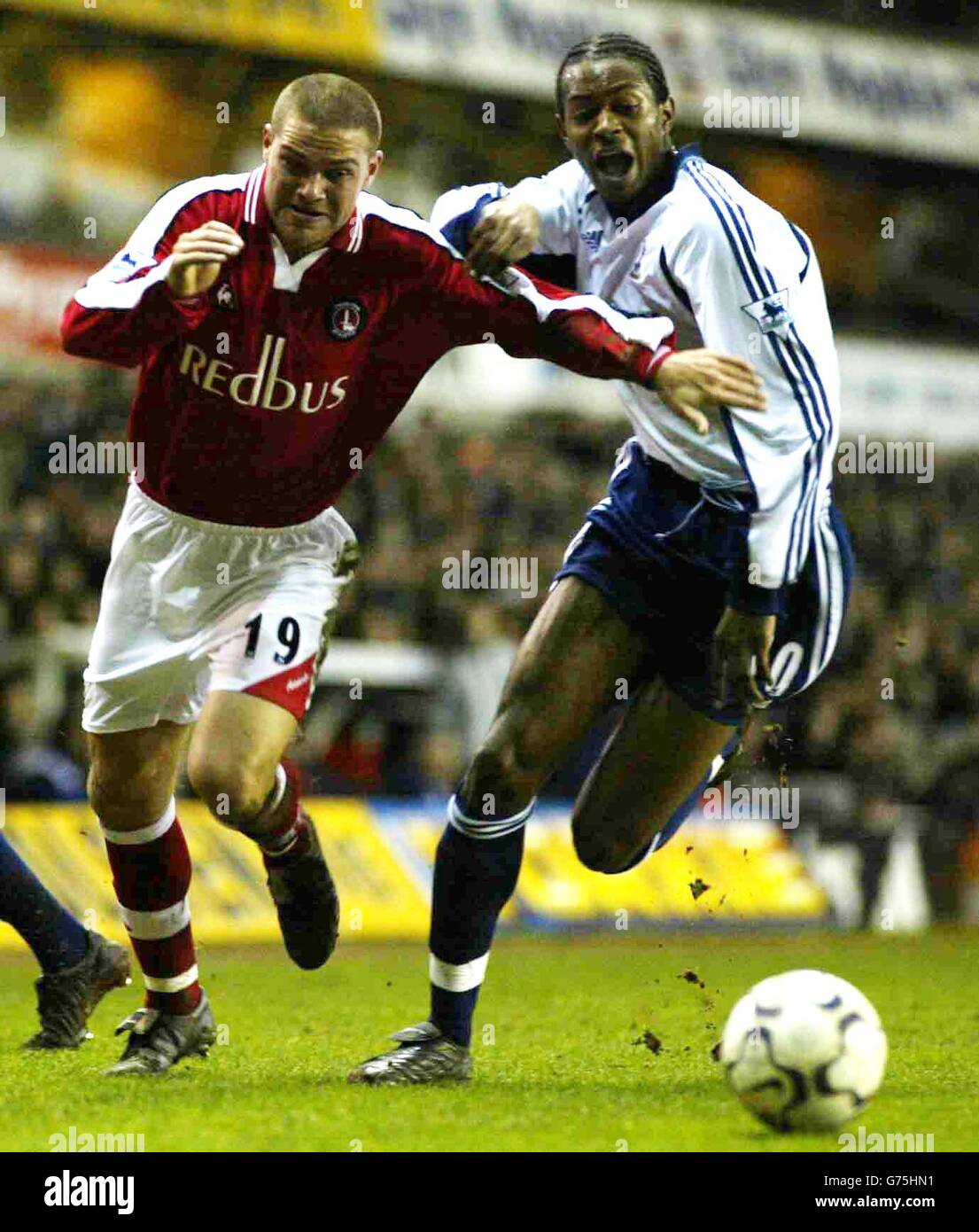 Tottenham's Anthony Gardner (right) and Charlton's Luke Young clash during the FA Barclaycard Premiership match at White Hart Lane, London. Stock Photo