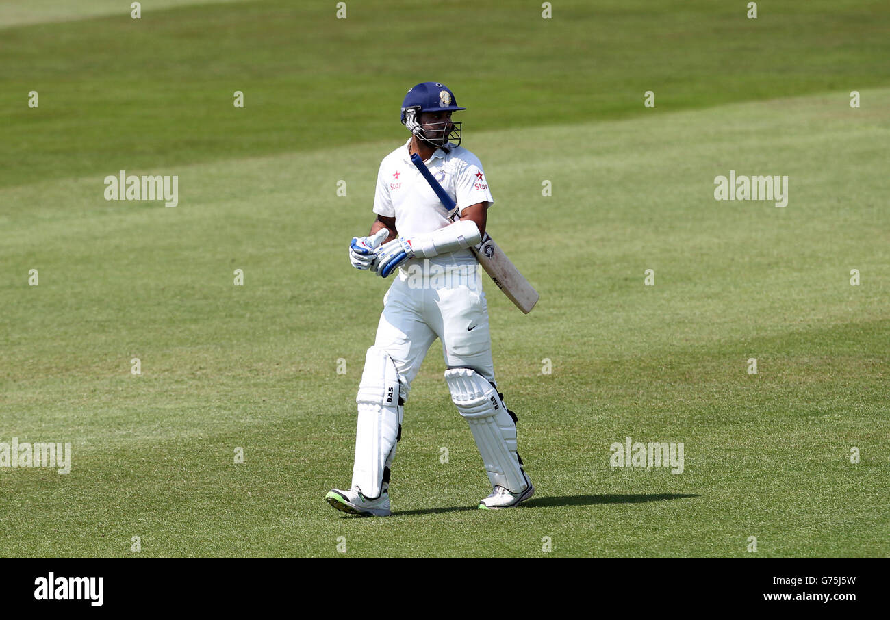 Indians' Murali Vijay walks back to the pavilion after being dismissed by Derbyshire's Ben Cotton during day two of the Internationa warm up match at The 3aaa County Ground, Derby. Stock Photo