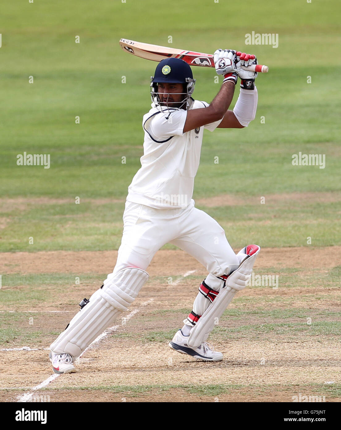 Indians' Cheteshwar Pujara bats during day two of the Internationa warm up match at The 3aaa County Ground, Derby. Stock Photo
