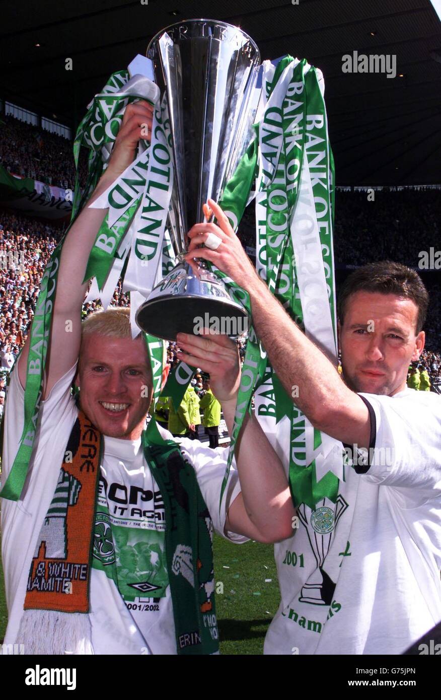 Celtic's Neil Lennon (left) and captain Paul Lambert (right) hold aloft the SPL trophy after their win over Livingstone, in their Bank of Scotland Scottish Premier League match at Celtic's Celtic Park stadium. Final Score: Celtic 5 Livingstone 1. *12/05/02 Celtic's Neil Lennon (left) and captain Paul Lambert (right) hold aloft the SPL trophy after their win over Livingstone, in their Bank of Scotland Scottish Premier League match at Celtic's Celtic Park stadium. Final Score: Celtic 5 Livingstone 1. Celtic and Rangers will be invited to join the English Nationwide League next season, it was Stock Photo