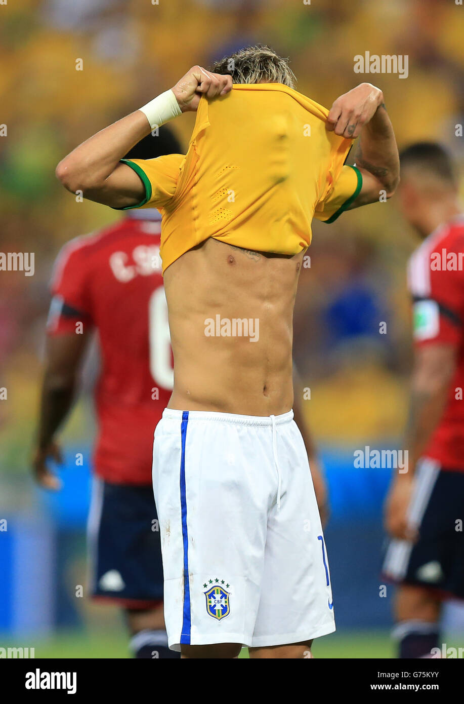 Soccer - FIFA World Cup 2014 - Quarter Final - Brazil v Colombia - Estadio Castelao. Brazil's Neymar pulls his shirt over his face after a missed chance during the quarter final match at the Estadio Castelao, Fortaleza. Stock Photo
