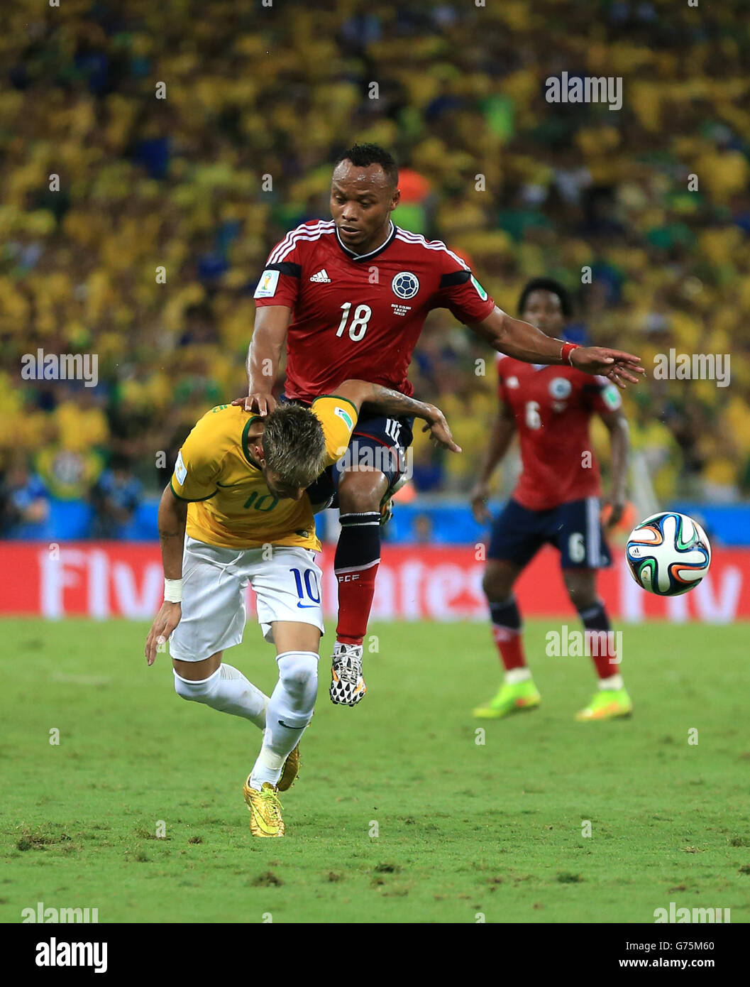 Brazil's Neymar sustains a back injury following a challenge from Colombia's Juan Camilo Zuniga during the quarter final match at the Estadio Castelao, Fortaleza. Stock Photo