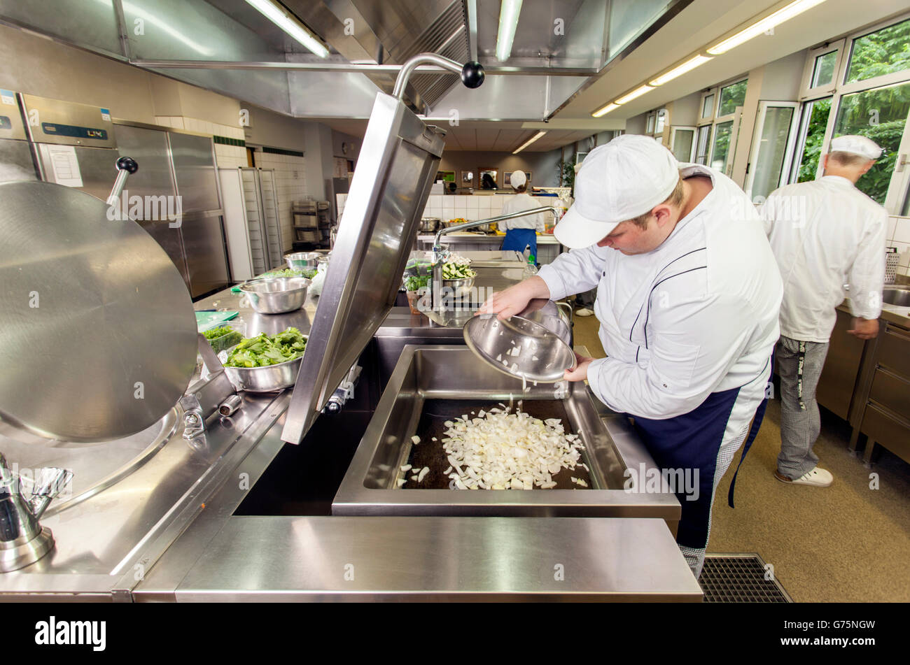 Preparation for lunch in a commercial kitchen. Stock Photo