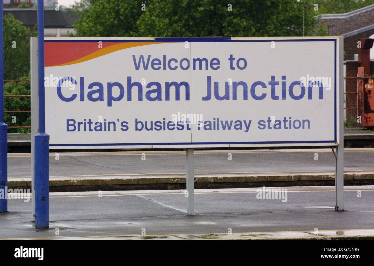 A sign at Clapham Junction in south London - dubbed Britain's busiest railway station, with some 2,000 trains a day - on a platfrom that is almost deserted in the rush hour as England play Nigeria in the World Cup. Stock Photo