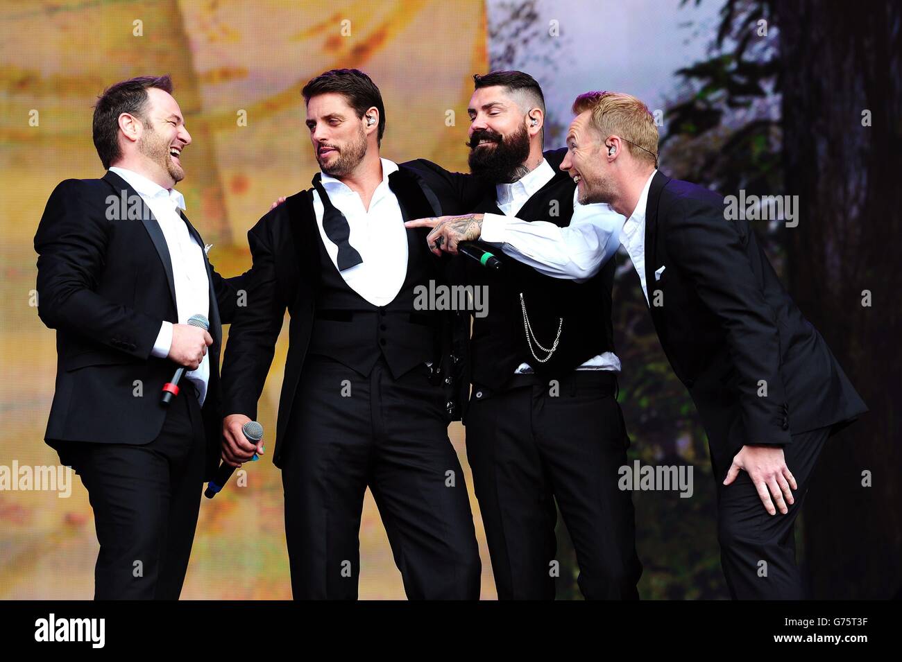 Boyzone (from left to right) Mikey Graham, Keith Duffy, Shane Lynch and Ronan Keating performing at the Barclaycard British Summer Time Festival in Hyde Park, London. Stock Photo