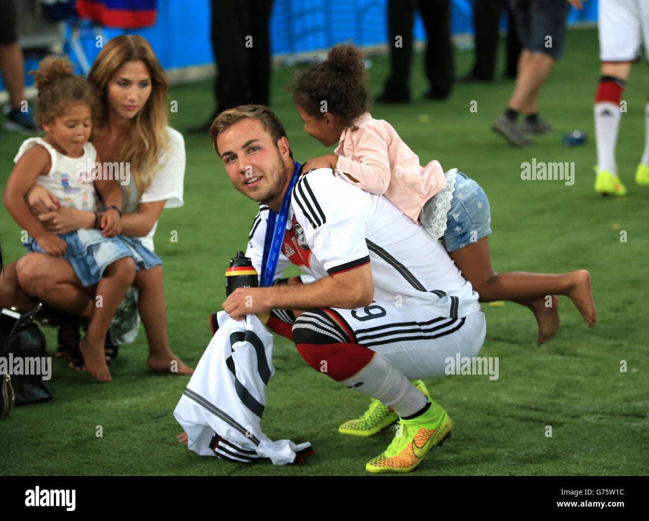 Soccer - FIFA World Cup 2014 - Final - Germany v Argentina - Estadio do Maracana. Germany's Mario Gotze celebrates on the pitch after lifting the FIFA World Cup 2014 Trophy Stock Photo