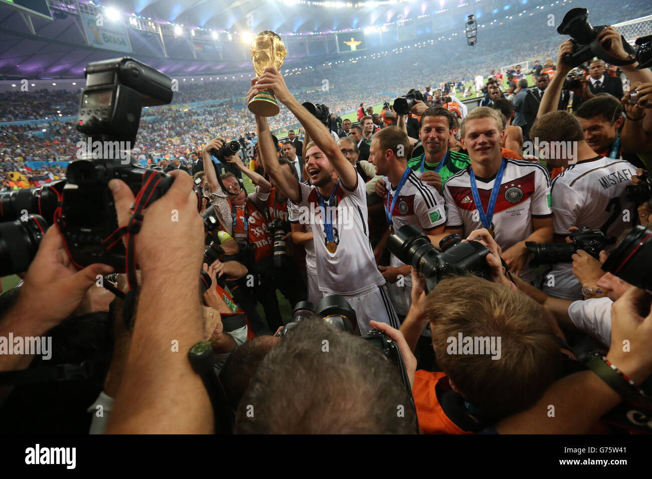 Soccer - FIFA World Cup 2014 - Final - Germany v Argentina - Estadio do Maracana. Germany's Christoph Kramer is mobbed by photographers after the FIFA World Cup Final at the Estadio do Maracana, Rio de Janerio, Brazil. Stock Photo