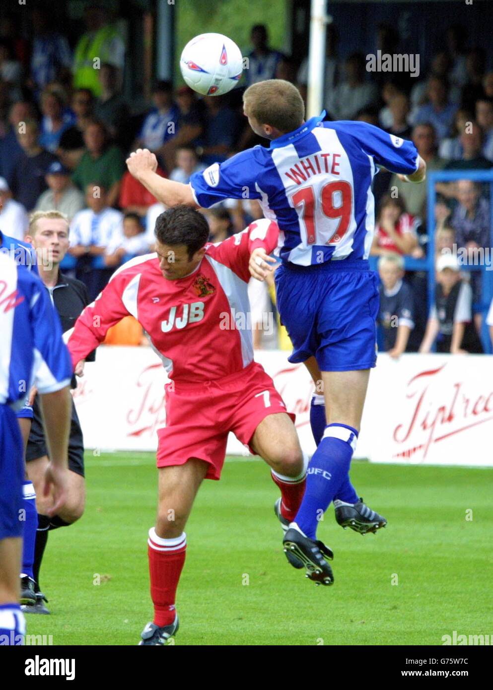 Karl Duguid of Wigan Athletic (left) and Alan White of Colchester tussle during the Nationwide Division Two game at Selhurst Park, London, Saturday August 31, 2002. Colchester 1.0. NO UNOFFICIAL CLUB WEBSITE USE. Stock Photo