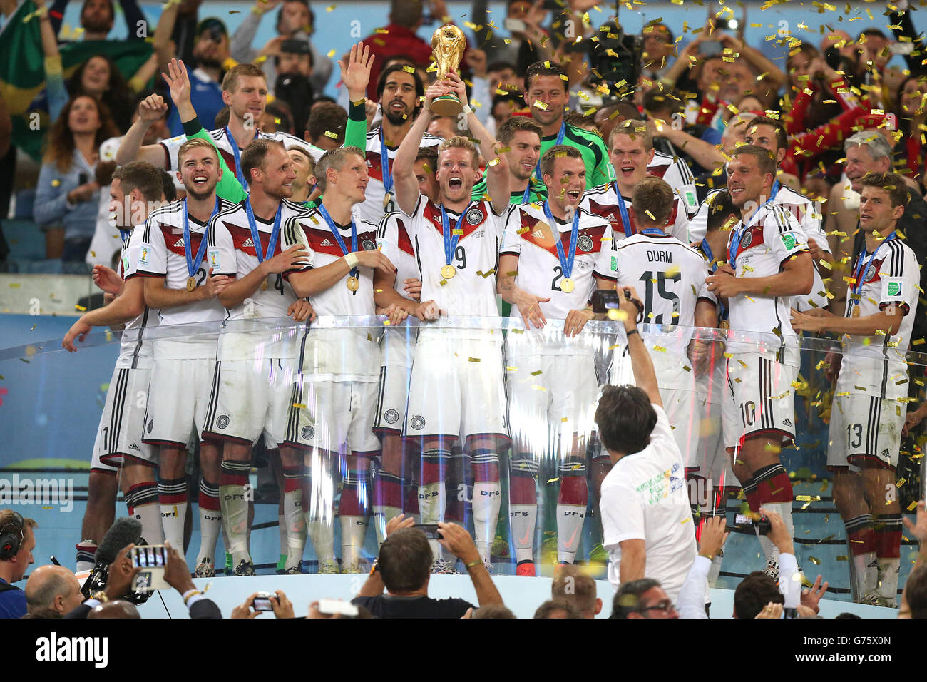Germany's Andre Schurrle lifts the trophy and celebrates victory in the World Cup Final Stock Photo